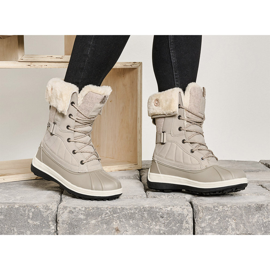 Snow Slider Mid Bottes d hiver femmes Chaussures Yellow